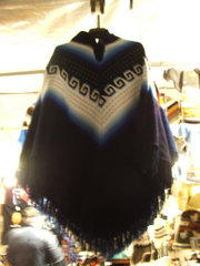 Typical Andes poncho in a flea market in Genoa, Italy 