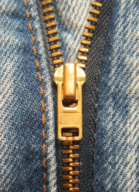 Closeup of the zipper on a pair of jeans