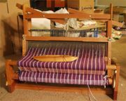 Four harness table loom.