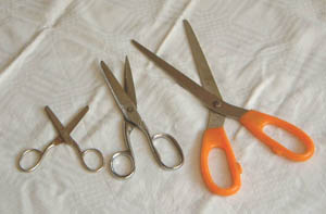 Different types of scissors -  sewing, kitchen, paper